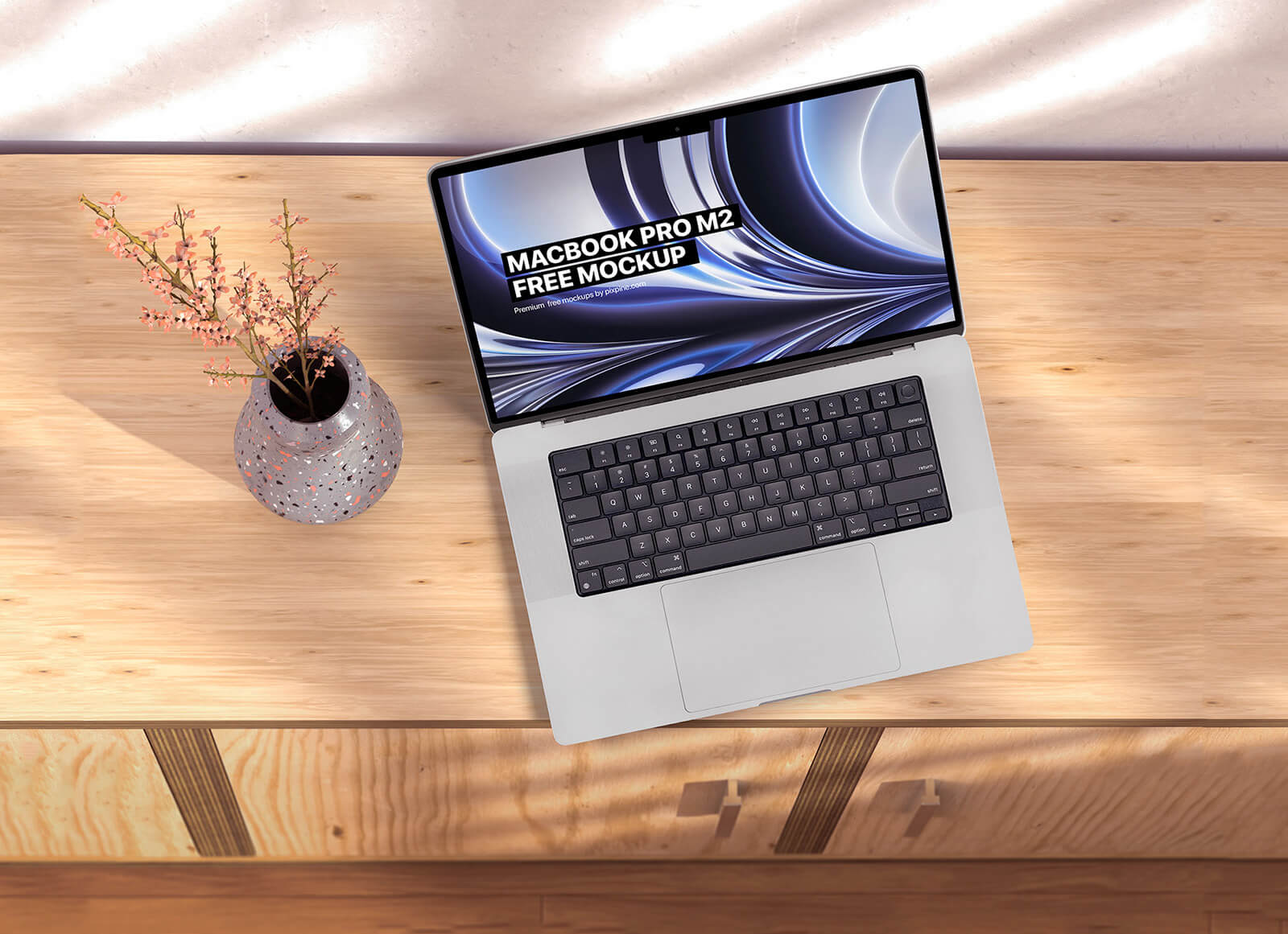 MacBook Pro M2 на макете деревянного шкафа