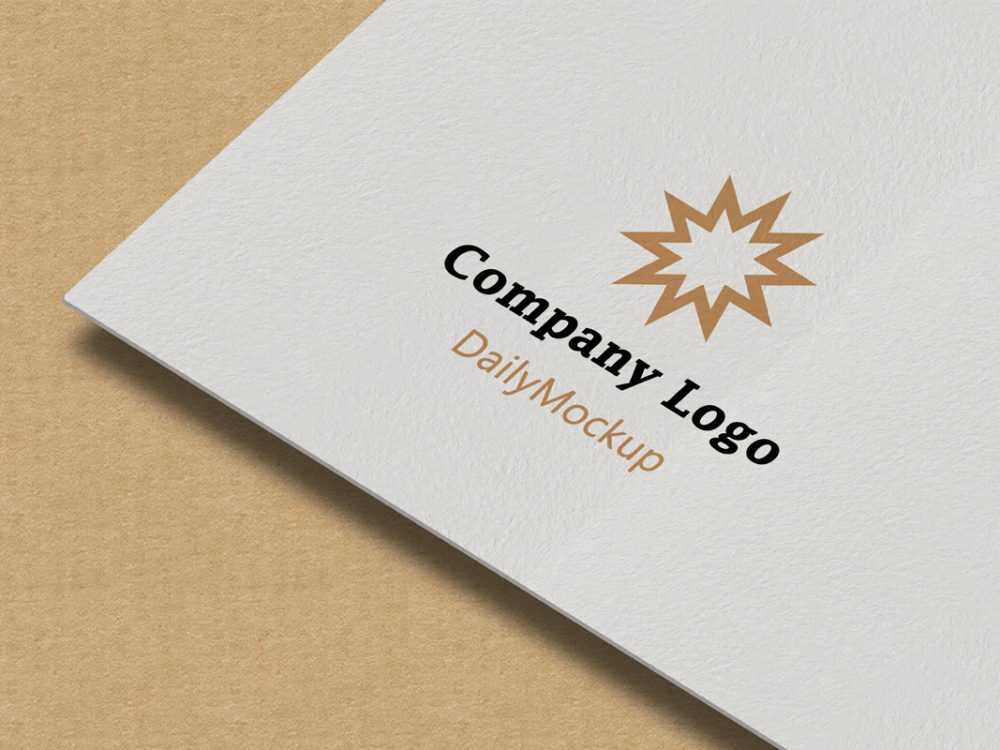 Maqueta del logotipo de la empresa sobre la textura del papel