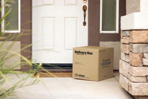 Brown Delivery Box At Door Step Mockup