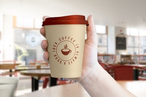 Hand Holding Coffee Cup Mockup