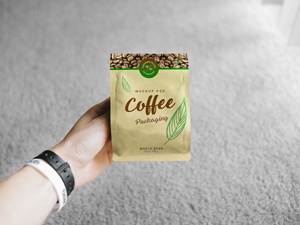 Hand Holting Coffee Bag Packaging Mockup