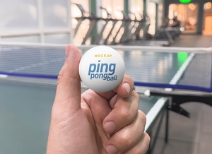 Hand Holding Ping Pong Ball Mockup PSD