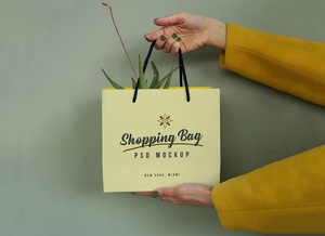  Hand Holding Shopping Bag Mockup