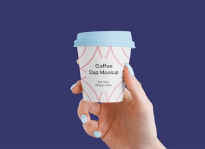 Hand Holding Small Coffee Cup Mockup
