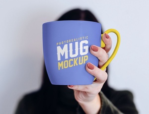 Mug in Female Hand Mockup