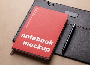 Notebook On Leather Pad Mockup