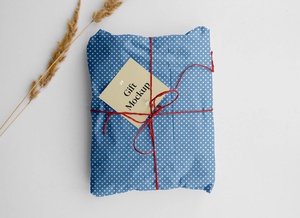 Paper Wrapped Gift With Card Mockup