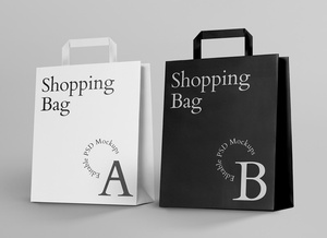 Maqueta de bolsas de compras de papel blanco y negro