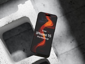 iPhone 15 Pro на бетонном кирпичном наборе макета