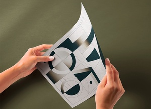 Hand Holding Glossy Paper Mockup