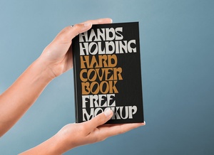 Hand Holding Hardcover Book Mockup