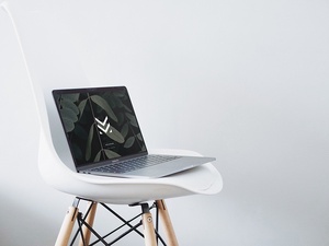 MacBook Mockup On Chair