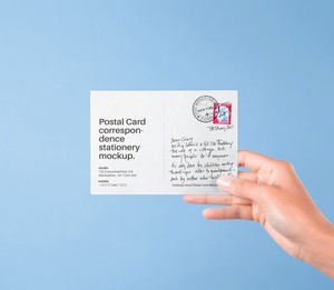 Free Hand Holding Postal Card Mockup
