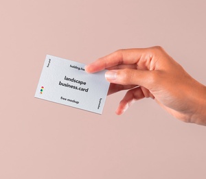 Hand Holding PSD Business Card Mockup