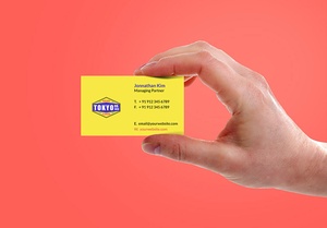 Free Holding Business Card Mockup